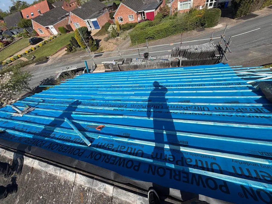 Blue roofing membrane and timber battens on a pitched roof